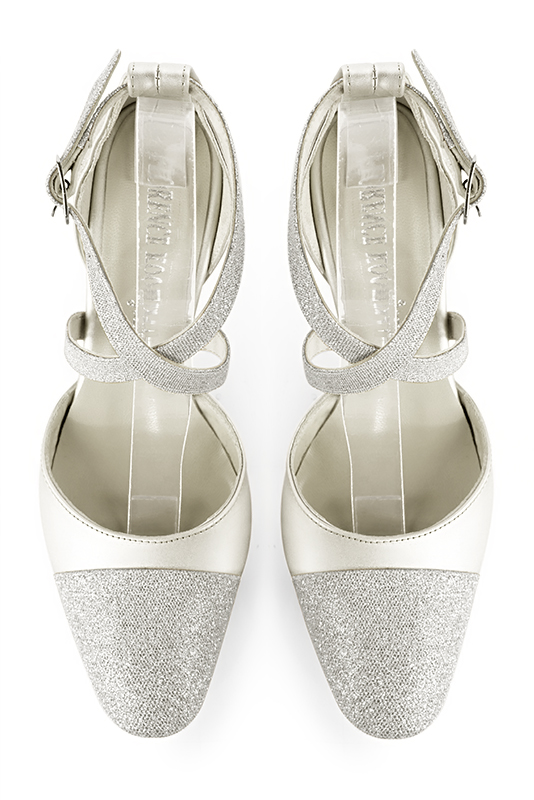 Light silver and pure white women's open side shoes, with crossed straps. Round toe. High slim heel. Top view - Florence KOOIJMAN